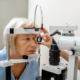 Senior woman during a medical eye examination with microscope in the ophthalmologic office