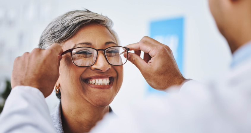 a woman getting glasses